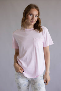 Local Girl Absolute Localflage T-Shirt for Women in Blossom; Person wearing a light pink t-shirt with a pocket on a plain background