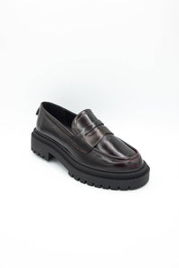 MIA Henrik Platform Loafers in wine red leather, featuring a chunky lug sole, round moc toe, and classic penny loafer strap detail, displayed against a plain white background.