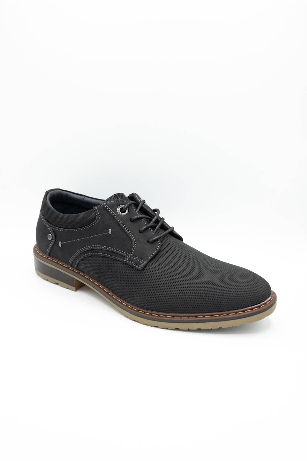 Brown leather shoe on a light gray background