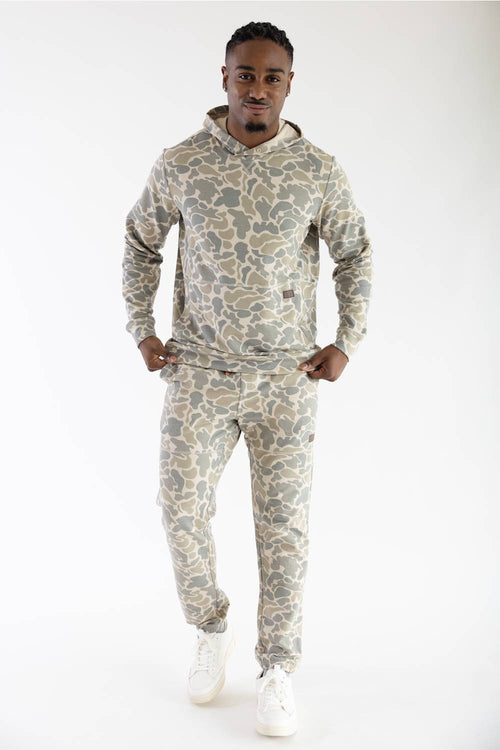 camo hoodie and jogger on man