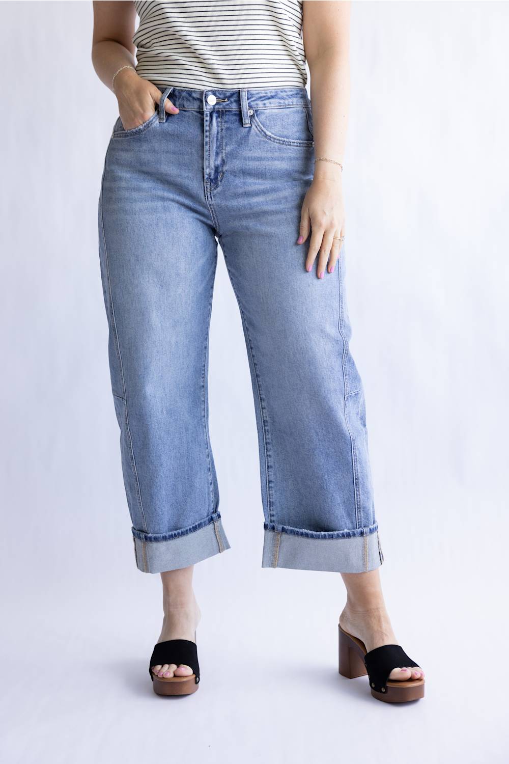 Mica High Rise Cuffed Barrel Jeans for Women; Person wearing light blue jeans on a white background