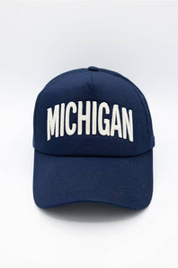 Michigan 3D Stitch Dad Hat in Navy; Navy blue cap with 'MICHIGAN' printed in white on a light gray background
