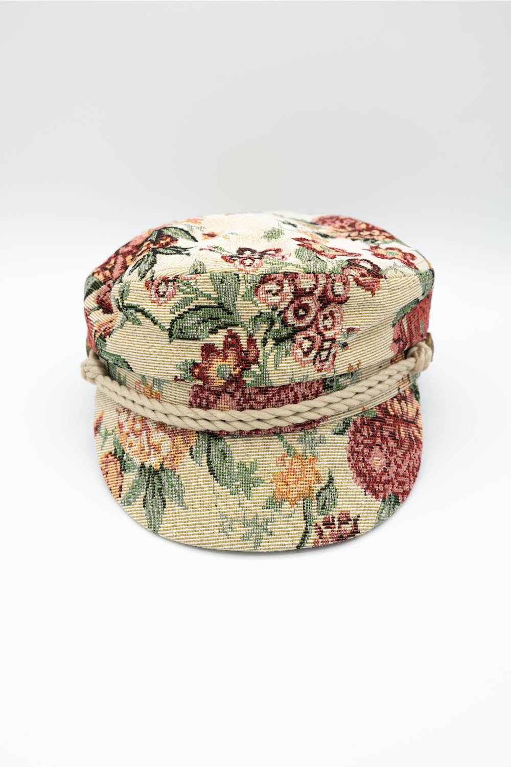 floral jacquard newsboy hat with rope detail on the brim
