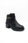 A pair of black leather ankle boots with chunky block heels, featuring a decorative strap with gold-tone buckles on the outer side and a side zipper, shown against a plain white background.

