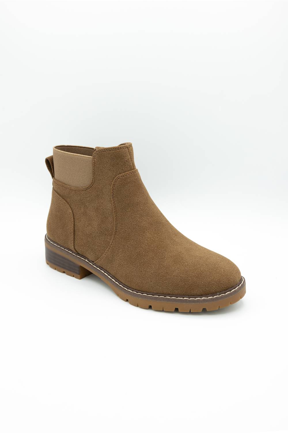A single brown suede Chelsea-style ankle boot with a low stacked heel and elastic side gore, photographed on a clean white studio background.