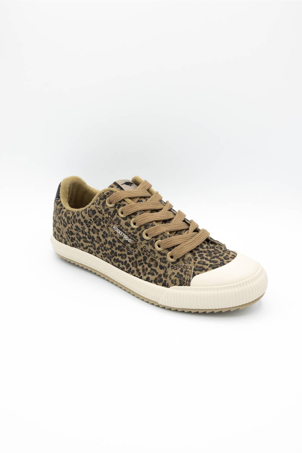 A low-top canvas sneaker featuring a brown and black leopard print pattern, tan laces, and a thick cream rubber toe cap and sole, shown against a plain white background.