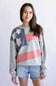 Flag USA Sweatshirt for Women in Grey; Person wearing a sweater with an American flag design on a plain background