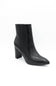 A single black leather ankle boot with a pointed toe and a chunky block heel, photographed from a three-quarters angle on a clean white background.