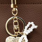 Small Pearl Bow Heart Purse Charm in Gold