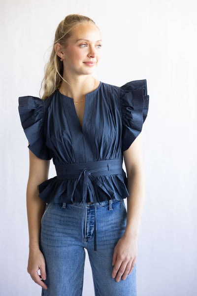 Strut & Bolt Flutter Sleeve Peplum Top for Women in Navy | T-50116