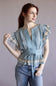 Embroidered Flutter Sleeve Peplum Top for Women in Chambray