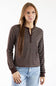A woman modeling a brown and white horizontally striped long-sleeve henley shirt with light blue jeans, set against a plain white studio background.