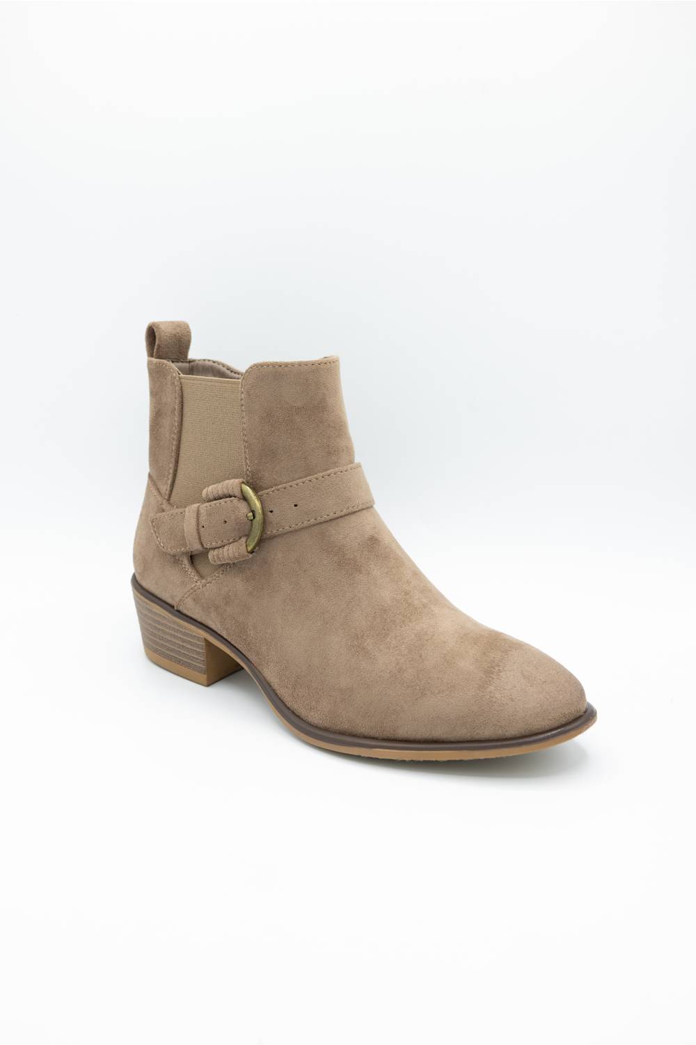 A taupe suede ankle boot with a side buckle strap and low block heel, shown from a three-quarters angle on a white background.
