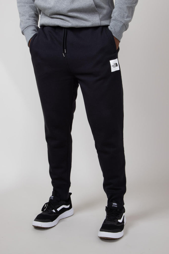 The North Face Core Joggers for Men in Black NF0A8A33 KY4 BLK Glik s