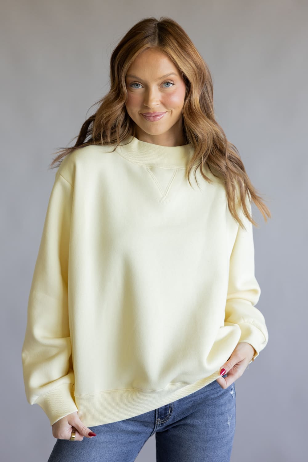 001-THINGS-BETWEEN-MOCK-NECK-FLEECE-PULLOVER-IN-BUTTER-YELLOW-TBT14112-BTR