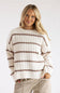 Front view of a blonde model smiling, wearing a Paper Cut Clothing / Pink Rose white and tan striped crewneck tunic sweater paired with beige utility pants against a plain backdrop.