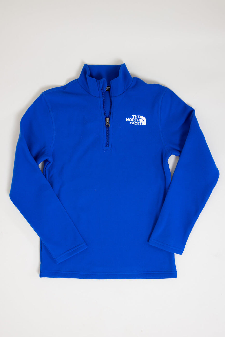 Blue north face half zip deals