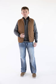 Full-length view of a model wearing a brown rhombus quilted vest, gray mock-neck sweater, medium-wash jeans, and brown shoes.