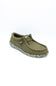 An olive green slip-on shoe with a textured fabric upper, matching laces, and a speckled gray and white sole, shown on a plain white background.