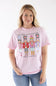 Blonde woman modeling a shirt that reads "yall are nuts" with nutcrackers below it 