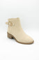 A single beige ankle boot with a low block heel, a side strap detail, and a gold buckle, shown against a plain white background.