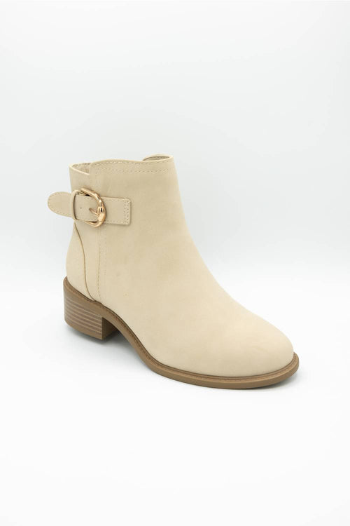 A single beige ankle boot with a low block heel, a side strap detail, and a gold buckle, shown against a plain white background.