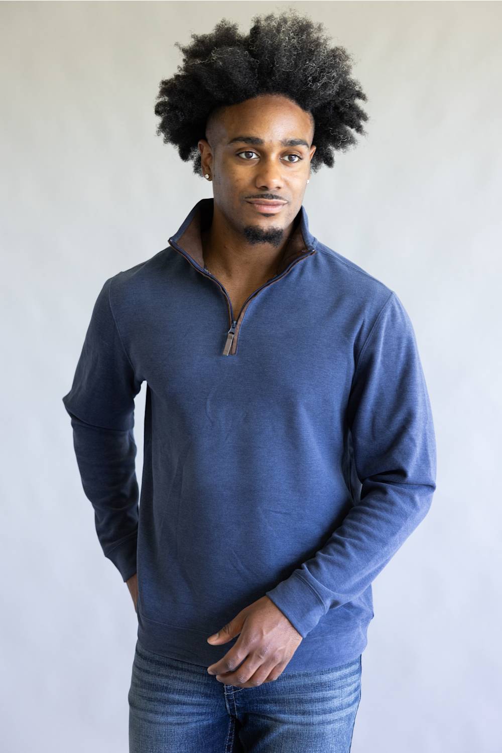 Butter soft, zipneck sweater with brown zipper and collar accents 