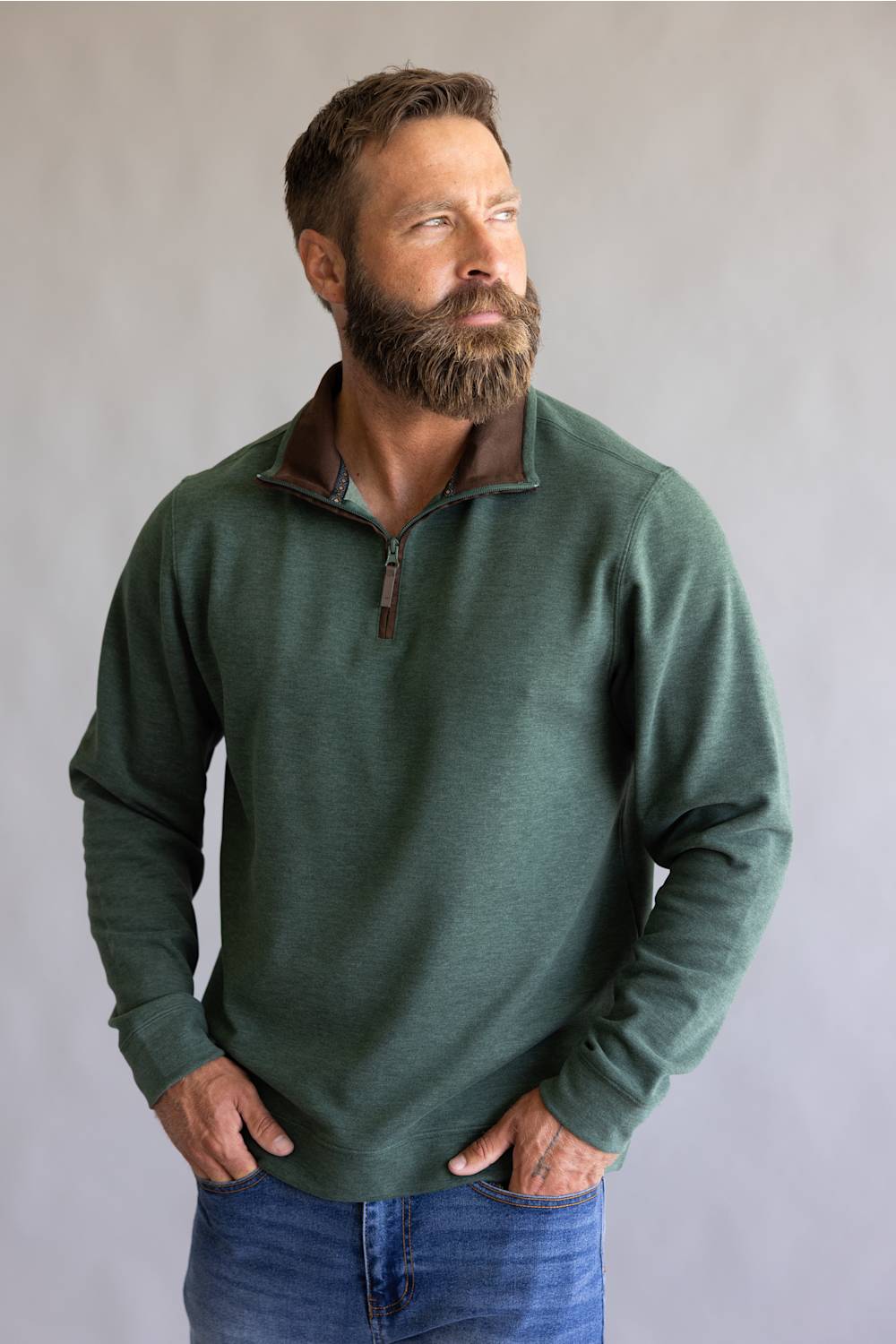 Buttery soft, zipneck pullover with brown zipper and collar accents 