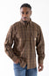 A man wearing a multi-color brown plaid button down shirt