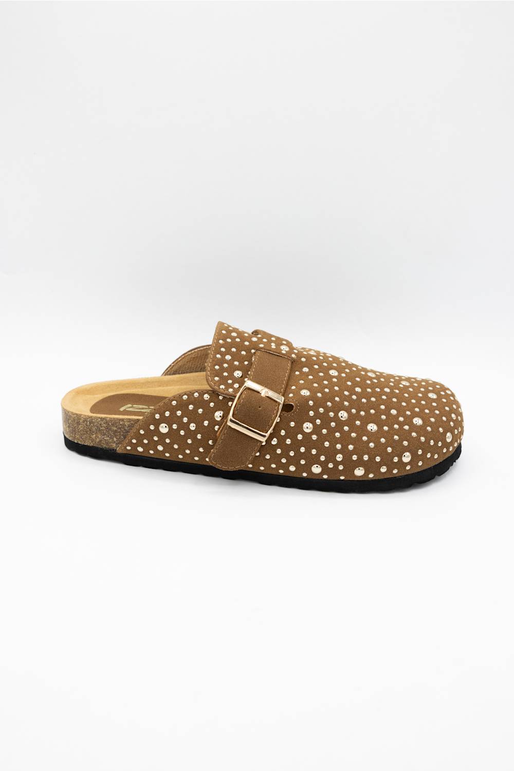 A single brown clog-style mule shoe with a dotted pattern, a brown strap with a gold-tone buckle, and a cork-textured midsole, shown against a plain white background.