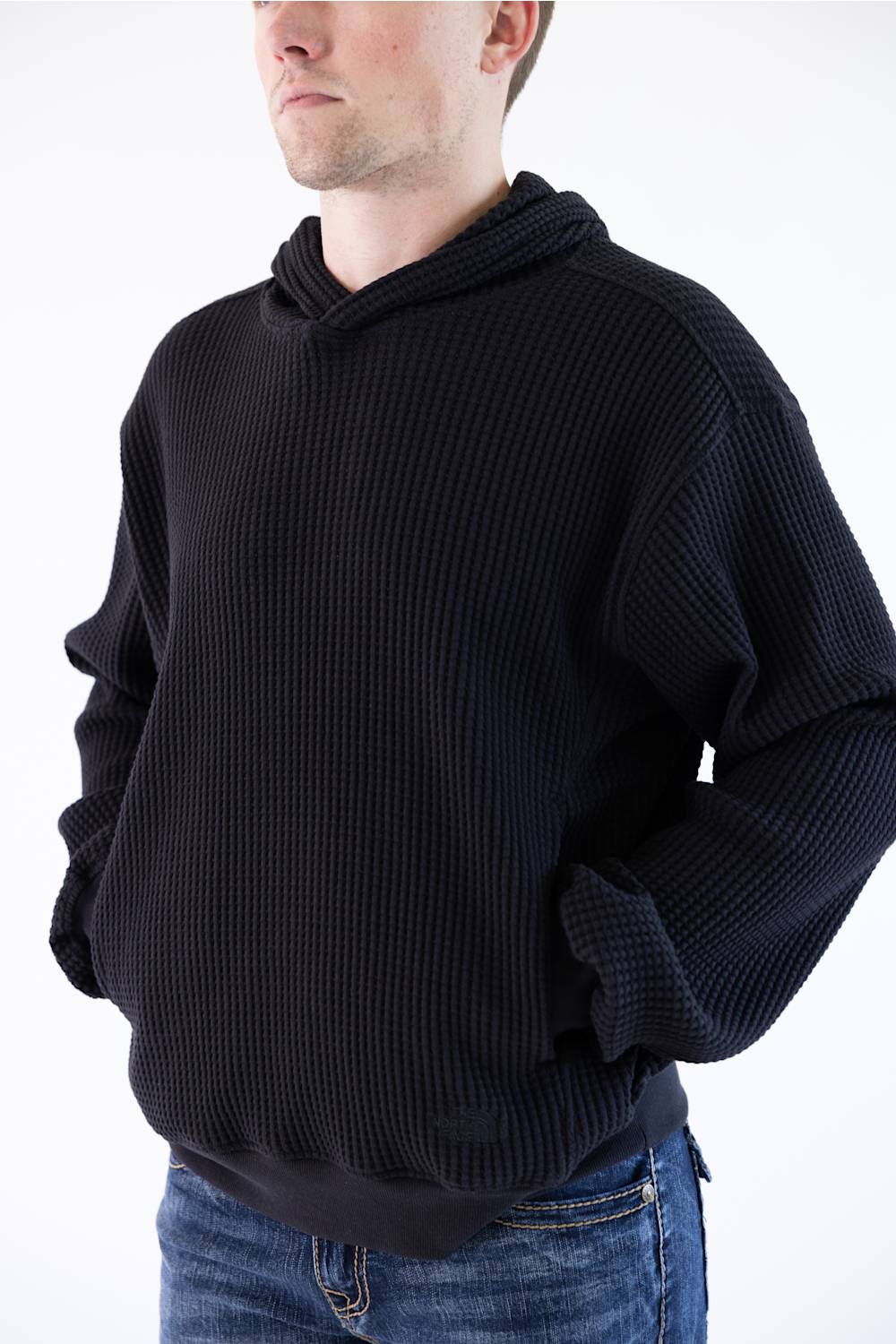 black hoodie on man