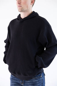 black hoodie on man