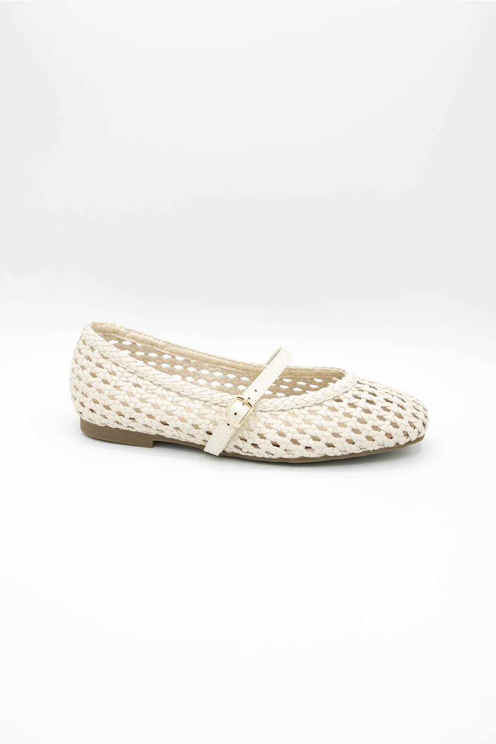 A single cream-colored woven mesh Mary Jane flat shoe with a small gold buckle, shown on a light gray studio background.