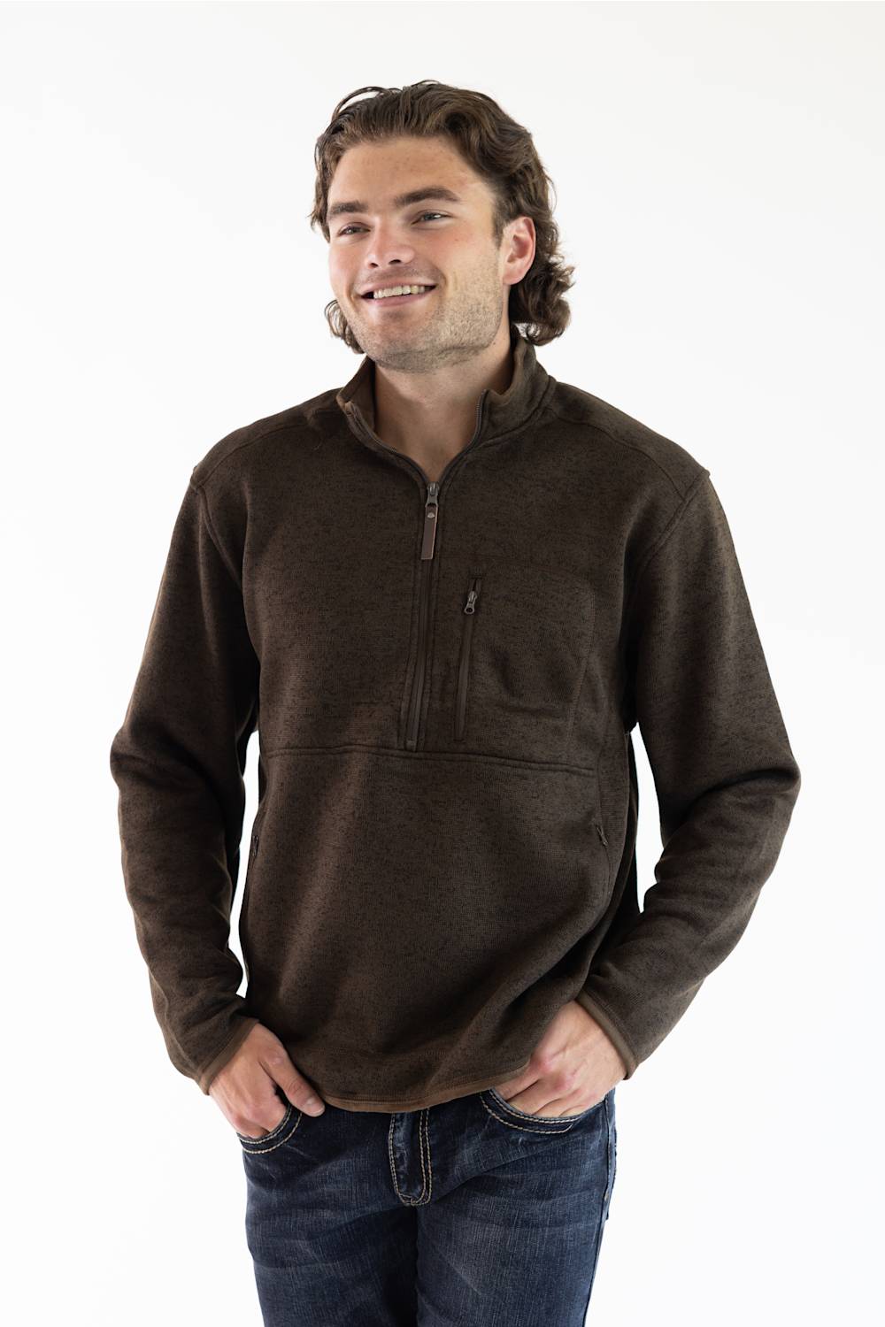A man wearing the Hallstatt Fleece Quarter Zip Pullover for Men in Heather Brown with a full zip front, knit-like material, vertical zipper pocket on the chest, and front hand pockets.