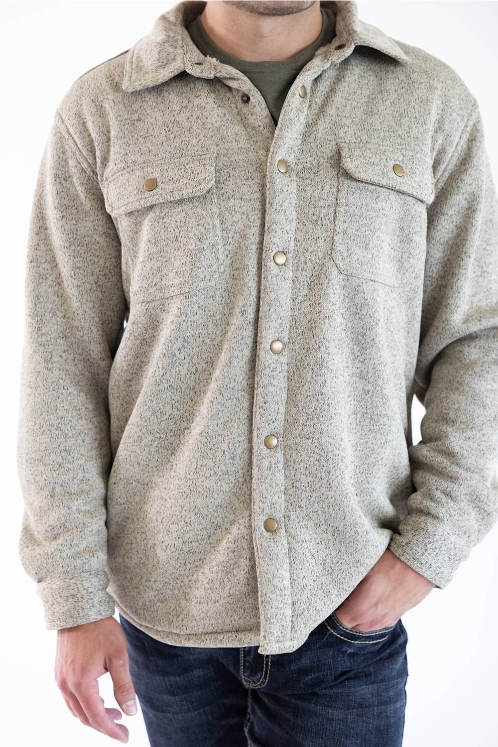 A close up of a man wearing a snap up Hallstatt Sherpa Lined Shacket for Men in Oatmeal Heather with two chest pockets.