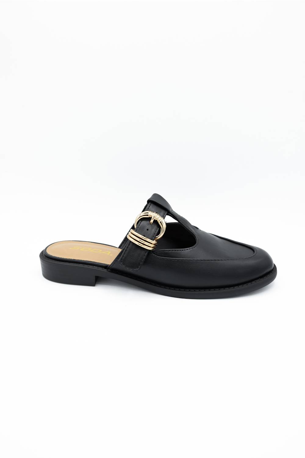 A black leather mule slide shoe with a gold-tone metal horsebit detail across the strap, set against a plain white background.