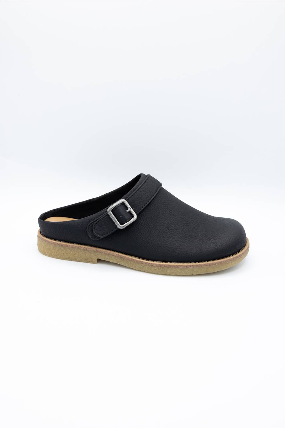 A black leather clog shoe with a single strap and a silver buckle, shown from a side profile on a white background.