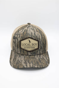 Local Boy Outfitters Youth Classic Hex Trucker Hat for Boys in Camo; Camouflage baseball cap with 'Local Boy Outfitters' logo on a white background