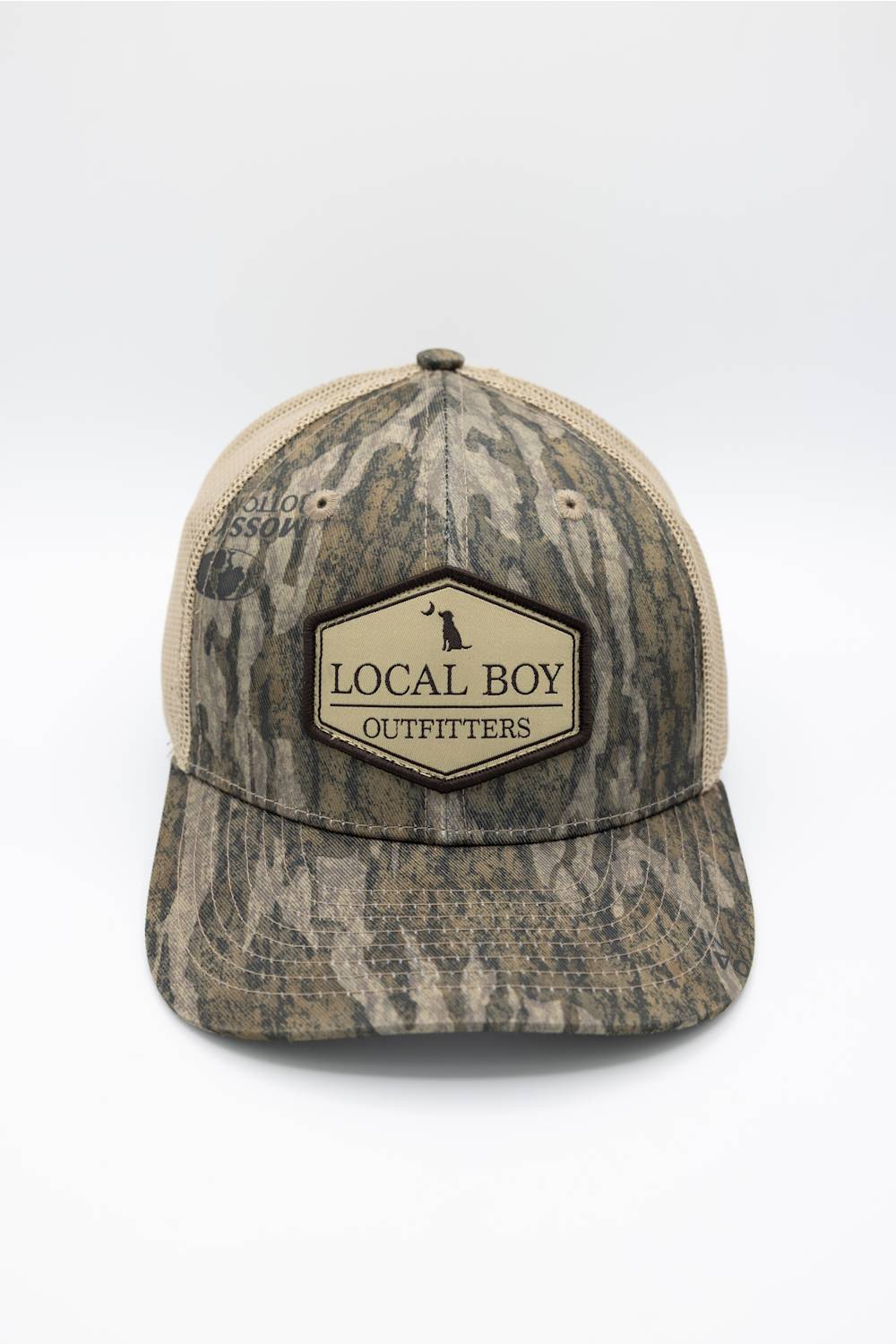Local Boy Outfitters Youth Classic Hex Trucker Hat for Boys in Camo; Camouflage baseball cap with 'Local Boy Outfitters' logo on a white background