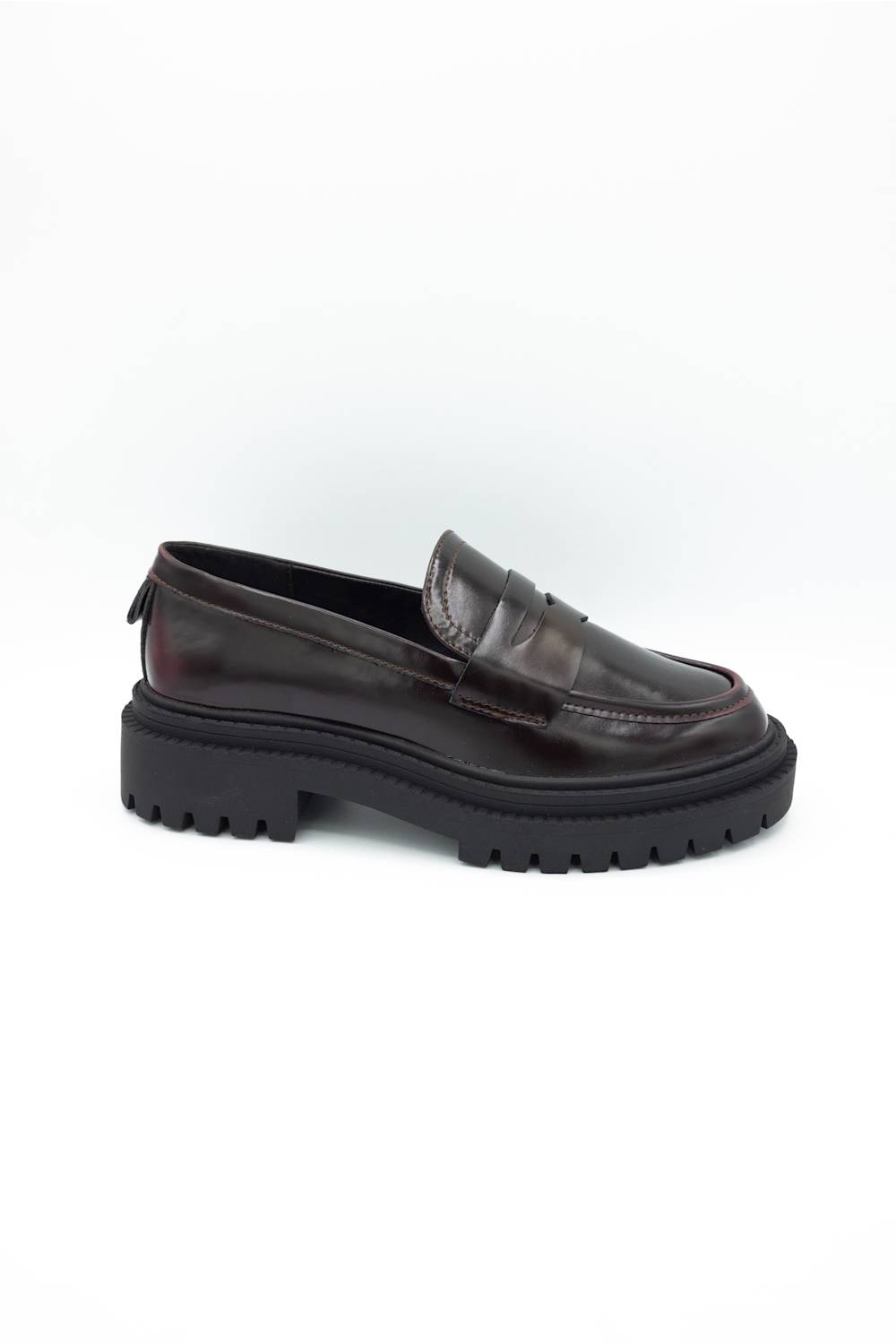 MIA Henrik Platform Loafers in wine red leather, featuring a chunky lug sole, round moc toe, and classic penny loafer strap detail, displayed against a plain white background.