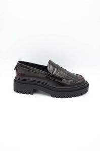 MIA Henrik Platform Loafers in wine red leather, featuring a chunky lug sole, round moc toe, and classic penny loafer strap detail, displayed against a plain white background.