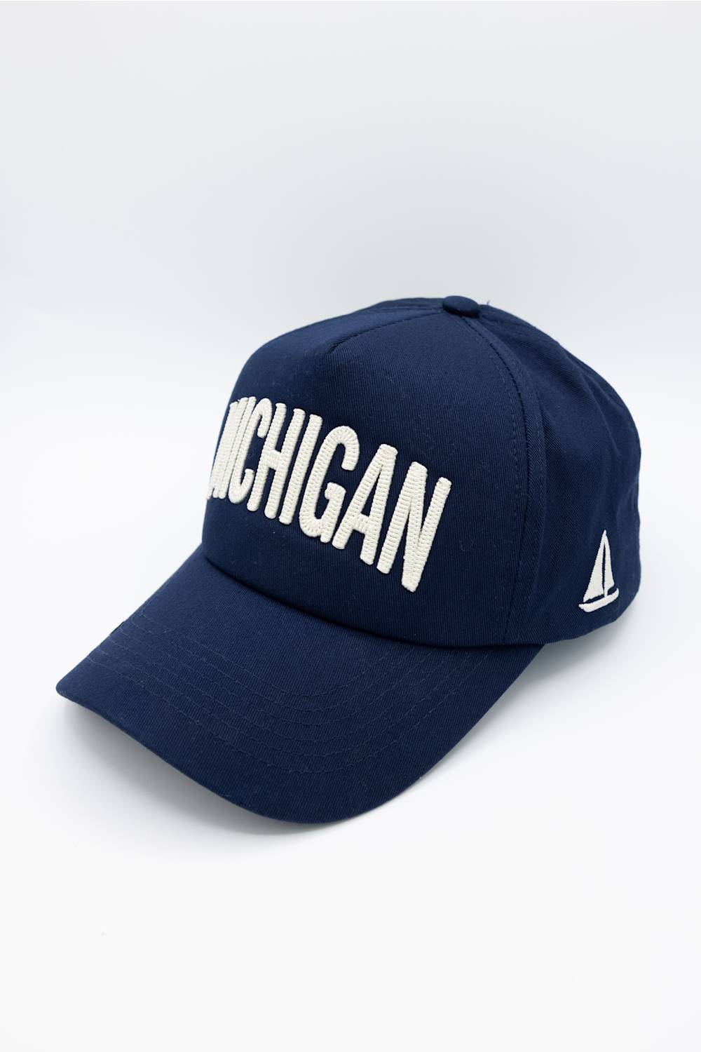 Michigan 3D Stitch Dad Hat in Navy; Navy blue cap with 'Michigan' text on a white background