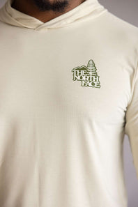 Close-up of green The North Face logo on The North Face Adventure Keep Climbing Hoodie in Desert Taupe