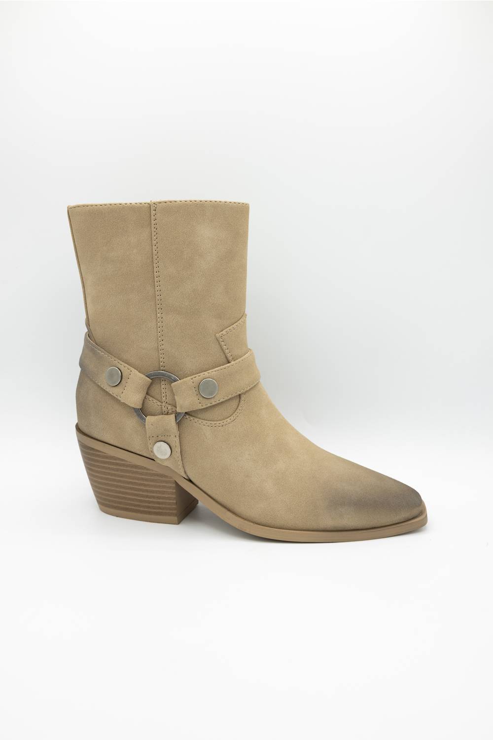 A beige suede ankle boot with a low stacked block heel, a decorative strap across the instep with silver-tone buttons, and a pointed toe, shown against a plain white background.