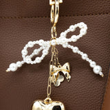 Pearl Bow Heart Purse Charm in Gold