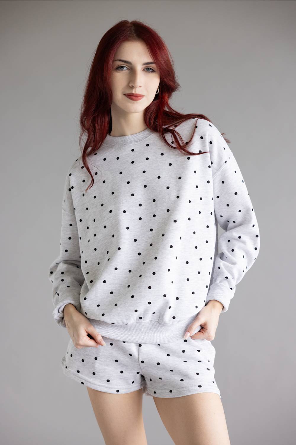 Polka Dot Fleece Crewneck for Women in Grey/Black; Woman wearing a polka dot set against a plain background