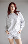 Polka Dot Fleece Crewneck for Women in Grey/Black; Woman wearing a polka dot set against a plain background