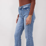 Risen High-Rise Frayed Slim Fit Jeans for Women in Medium Wash