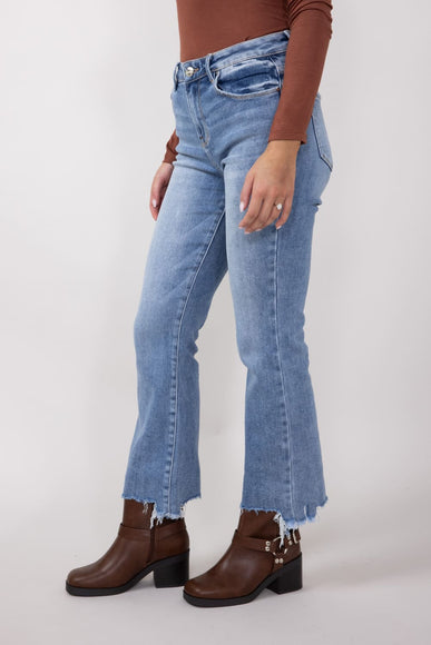 Risen High-Rise Frayed Slim Fit Jeans for Women in Medium Wash