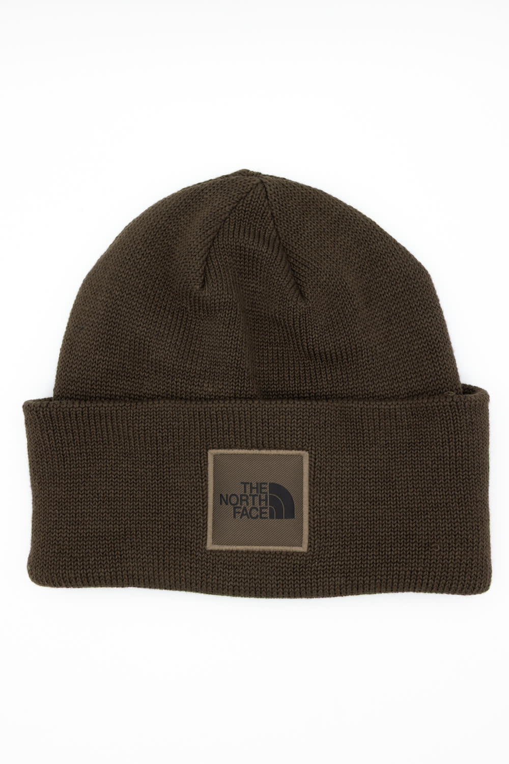 Front view of a dark chestnut brown ribbed knit beanie featuring a folded cuff hem with a square patch displaying The North Face logo against a solid white background.